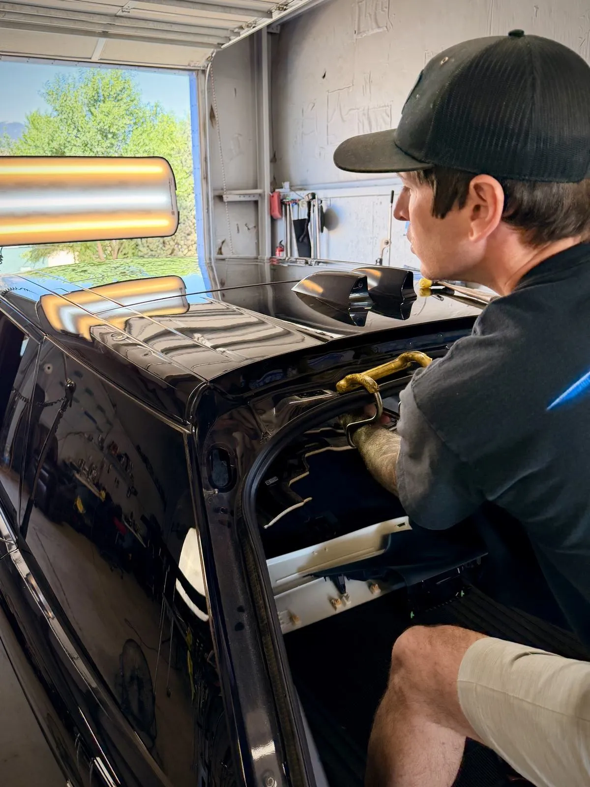Vehicle roof hail damage repair at Certified Hail and Dent